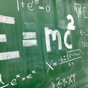 Math Equations on a Chalk Board